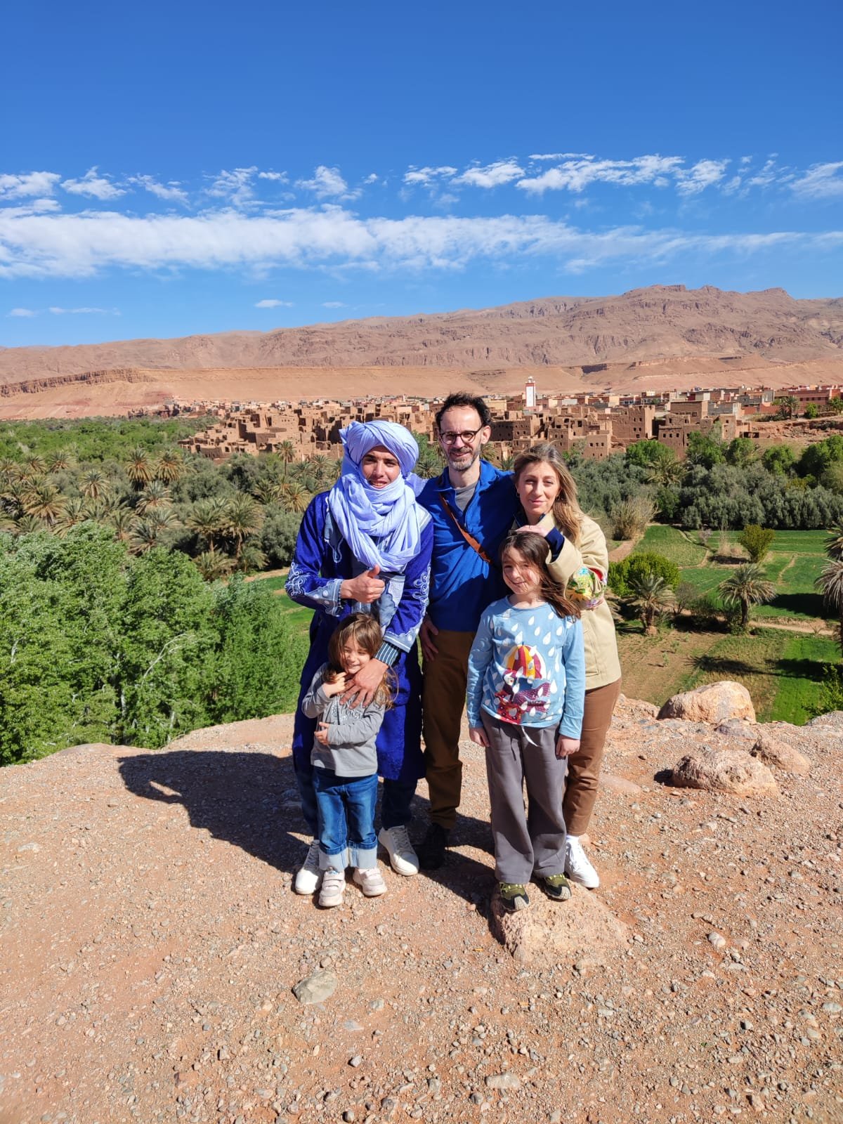 family in the Sahara desert in Morocco